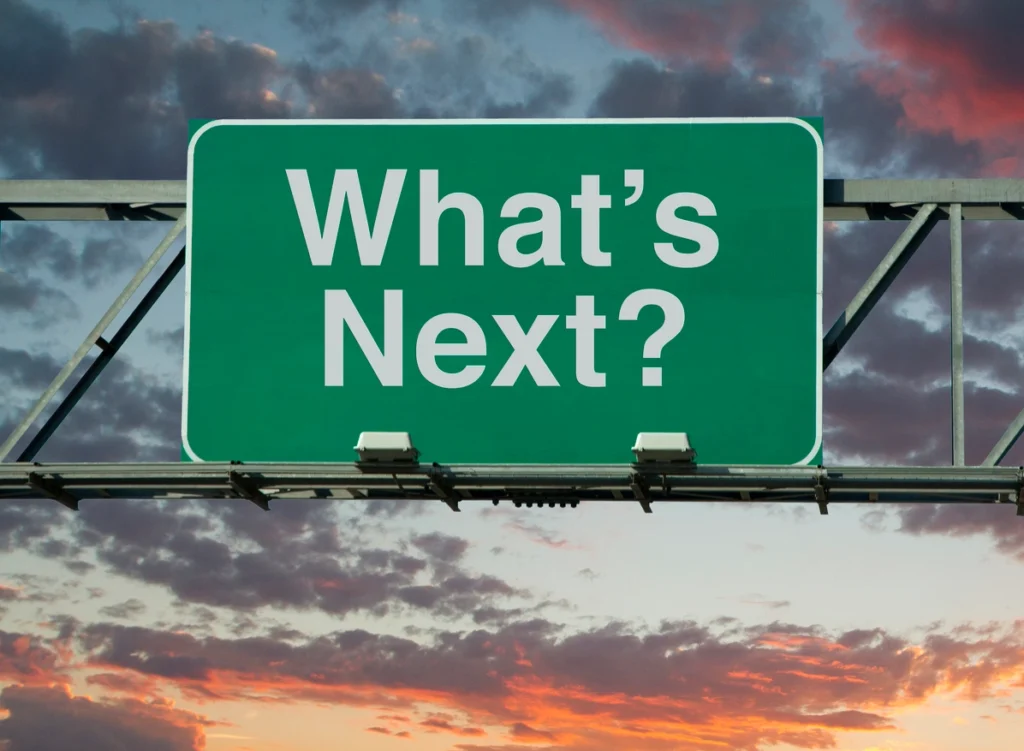 highway road sign with "what's next?" to denote the next steps after Phase I ESA